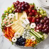 Artisan cheeses and fresh fruit create an enchanting display in this Enchanted Forest Grazing Board.