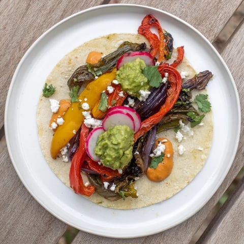 Desert Bloom Cactus Taco Board with colorful roasted vegetables and warm tortillas ready to serve.