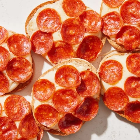 Dragon Scale appetizer arranged beautifully, with crispy pepperoni and warm, semi-firm cheese slices.