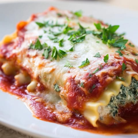 Hühnchen und Spinat Lasagna Rollen